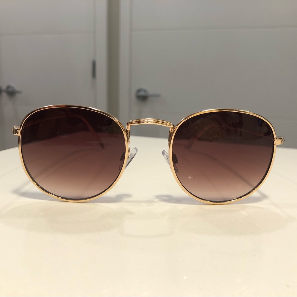 Gold rim sunglasses